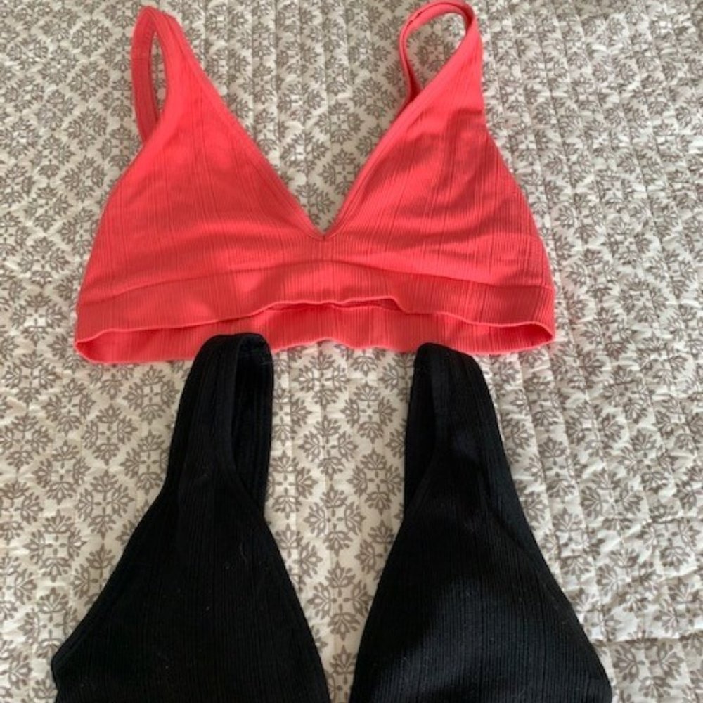 Pair of VS Pink Seamless Plunge Bralettes medium